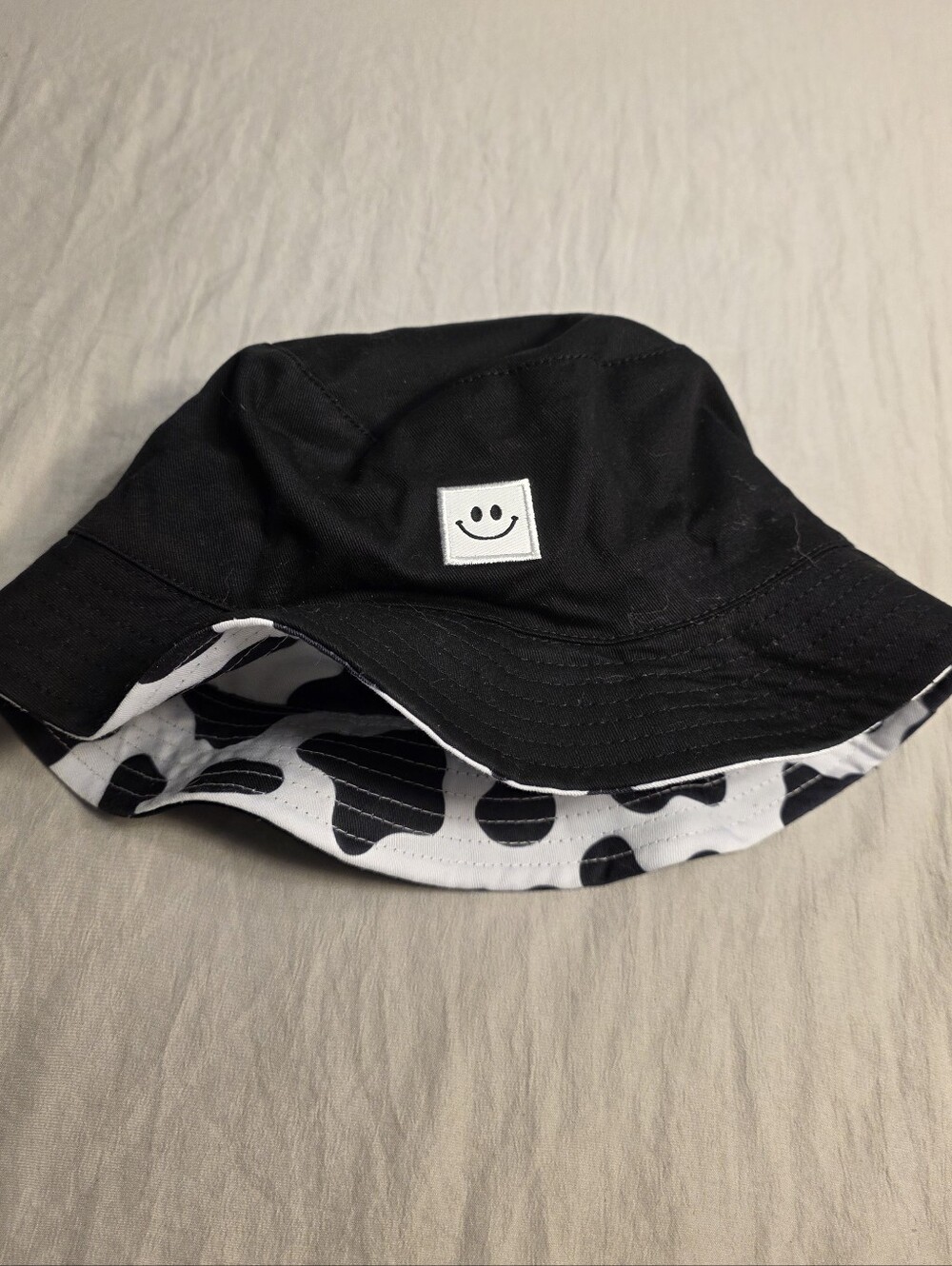 Black Reversible Bucket Hat Smiley Patch/Cow Print
